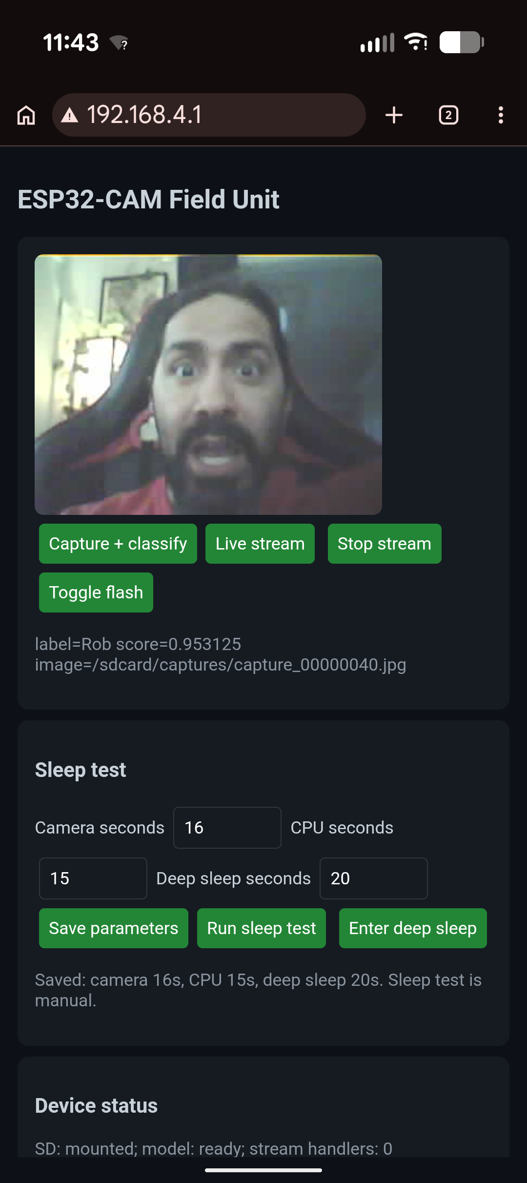 Phone screenshot of the ESP32-CAM local interface showing a captured image, capture-and-classify controls, a returned Rob label and score, and device readiness information.